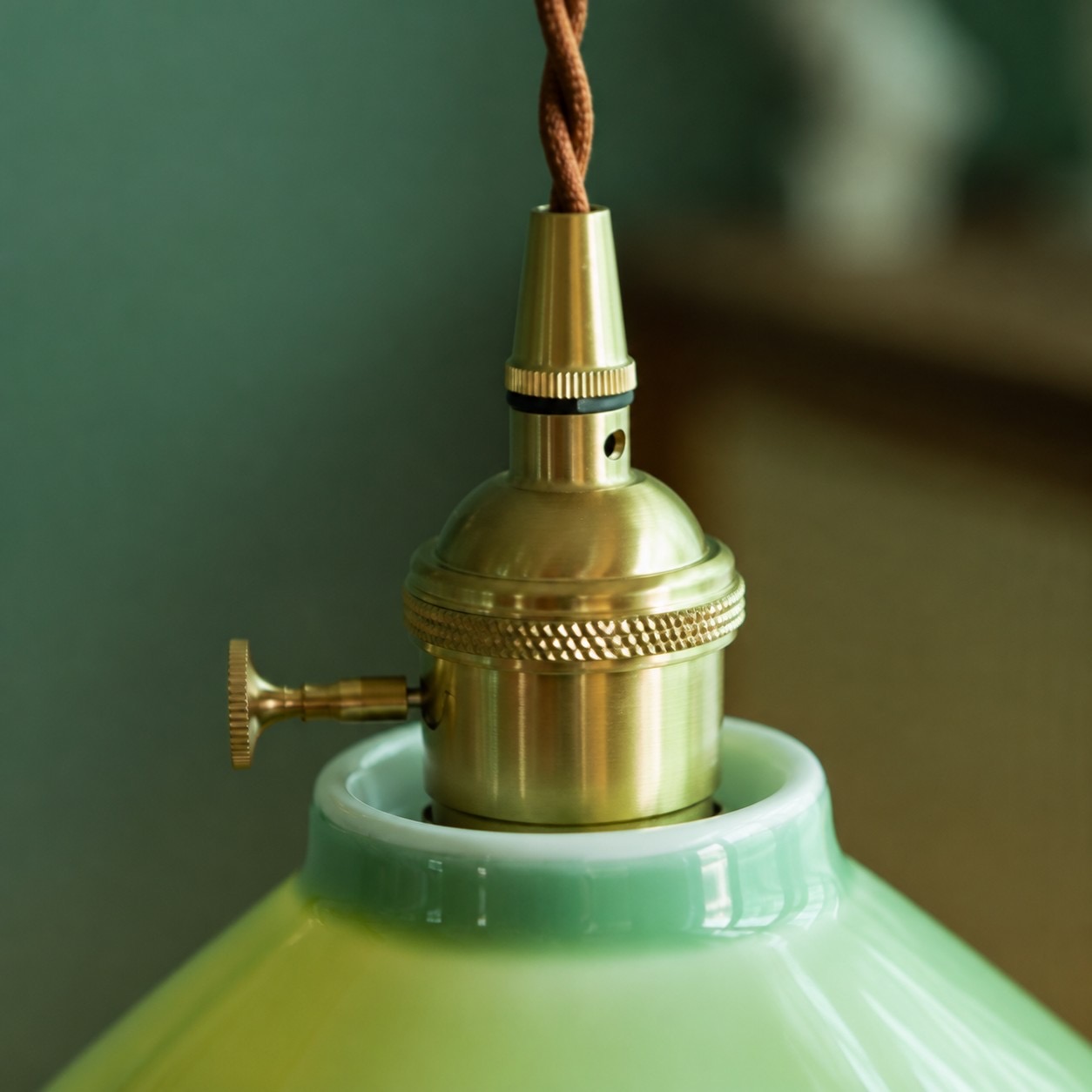 Brass holder and ceramic neck detail