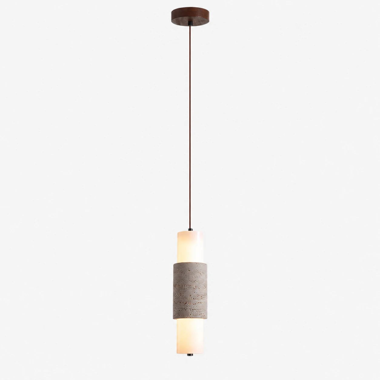 Full drop view of the slim travertine pendant lamp and ceiling canopy