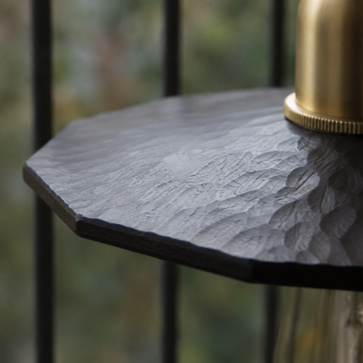Hand-carved octagonal black walnut shade texture