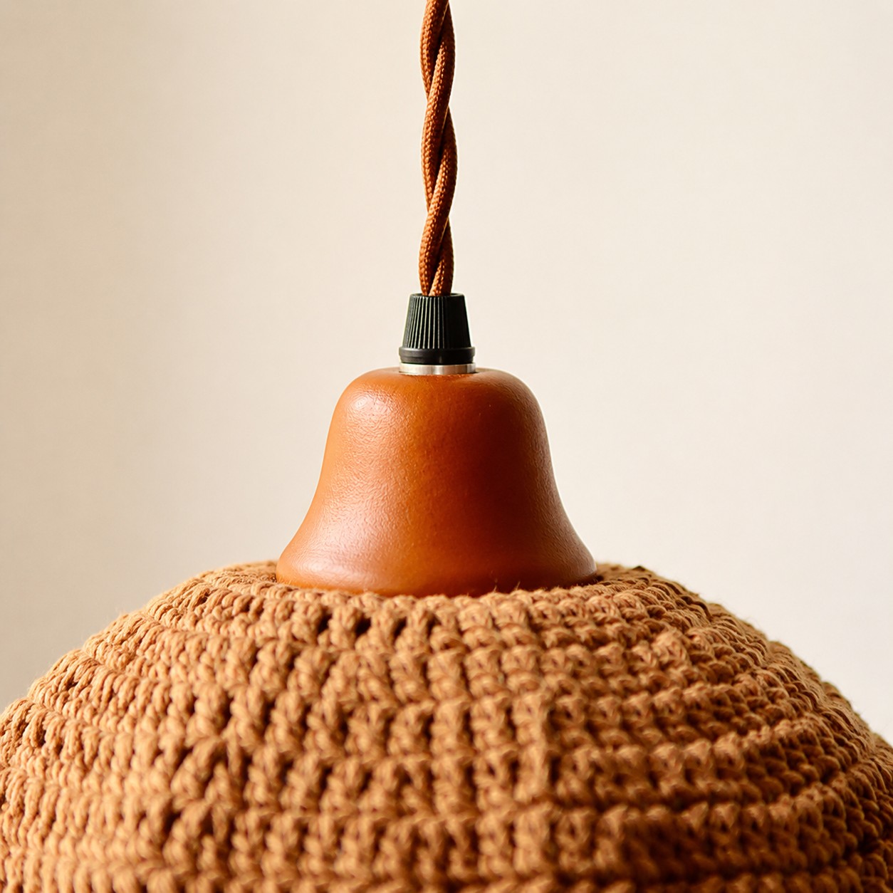 Wood lamp cup and twisted cord detail