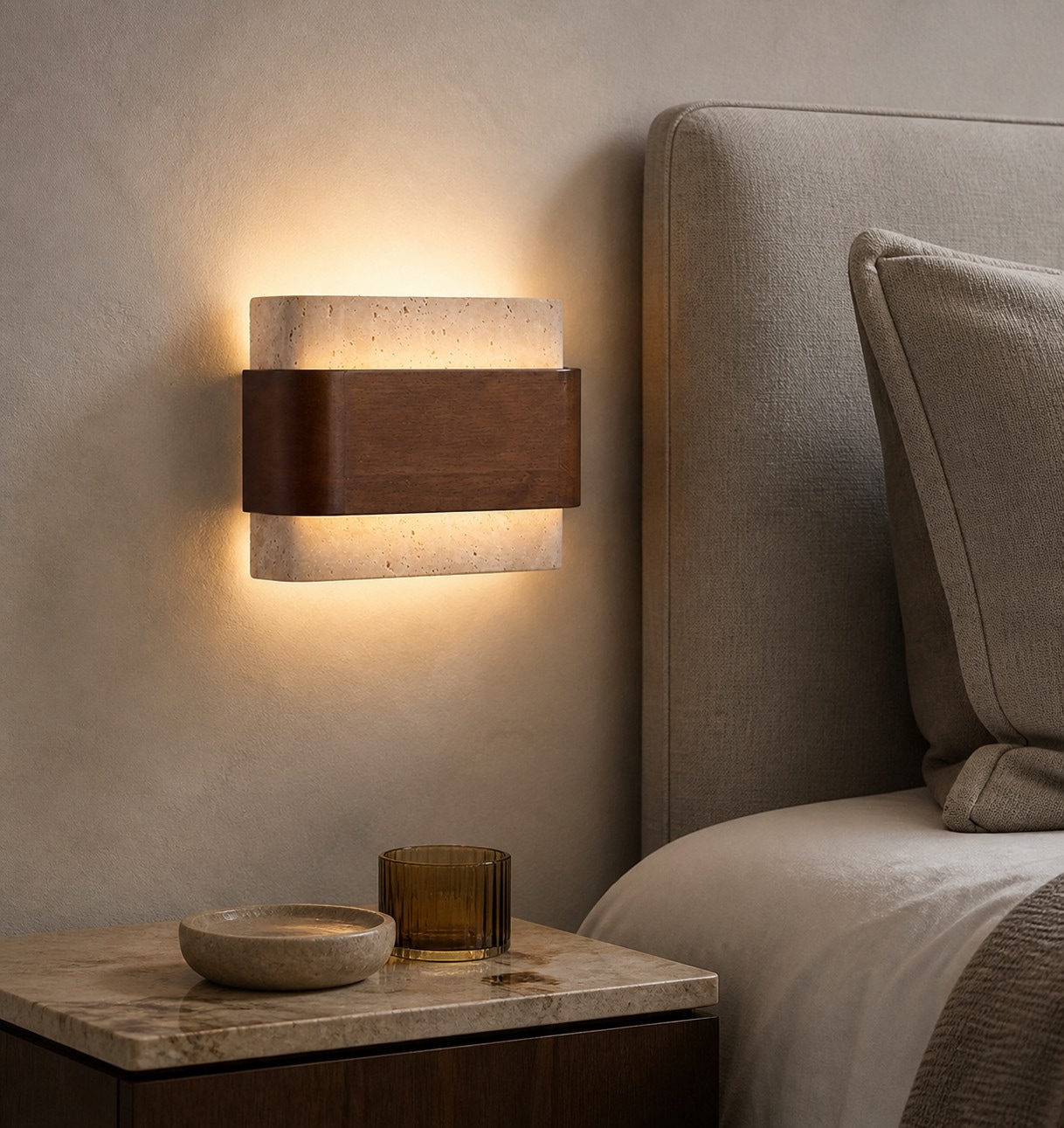 Travertine wood wall light beside a bedroom headboard