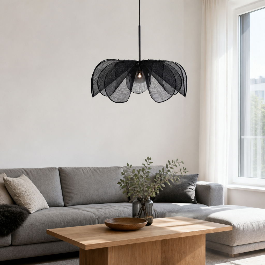 Black handwoven petal pendant light in living room, 60 cm