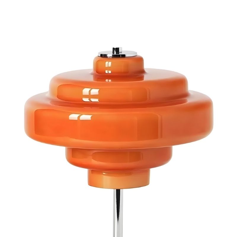 Detail van de gelaagde glazen tafellampenkap van Koloro in oranje.